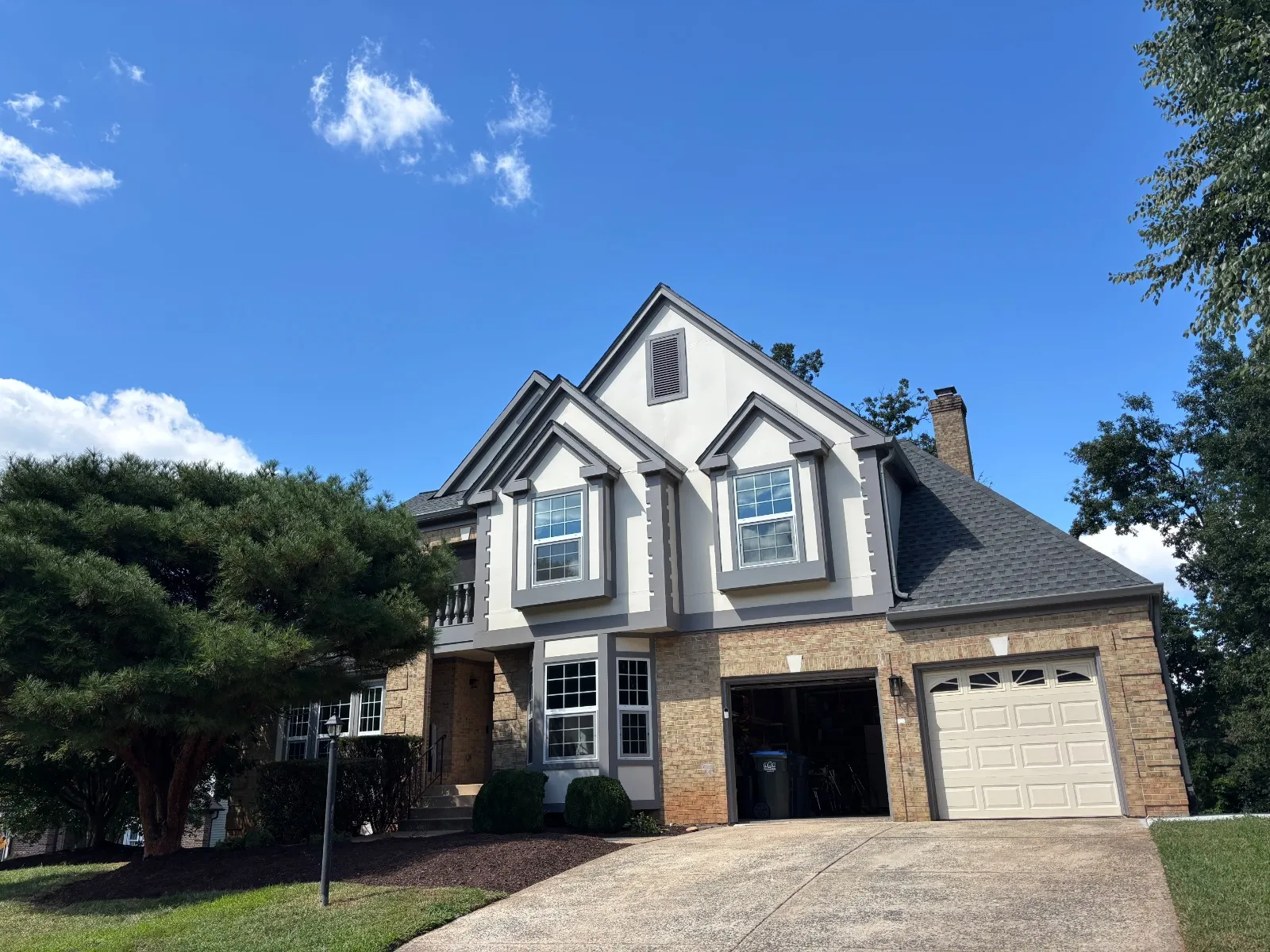 Custom home entrance with a statement front door